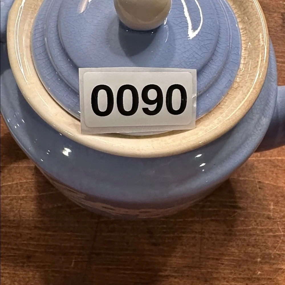 Vintage Blue Ceramic Teapot with Floral Design and Lid